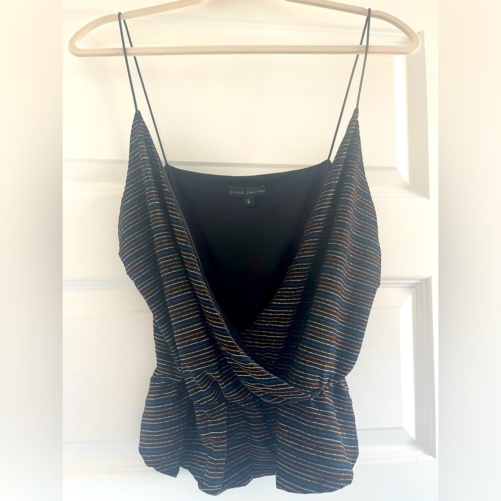 Size large metallic striped top